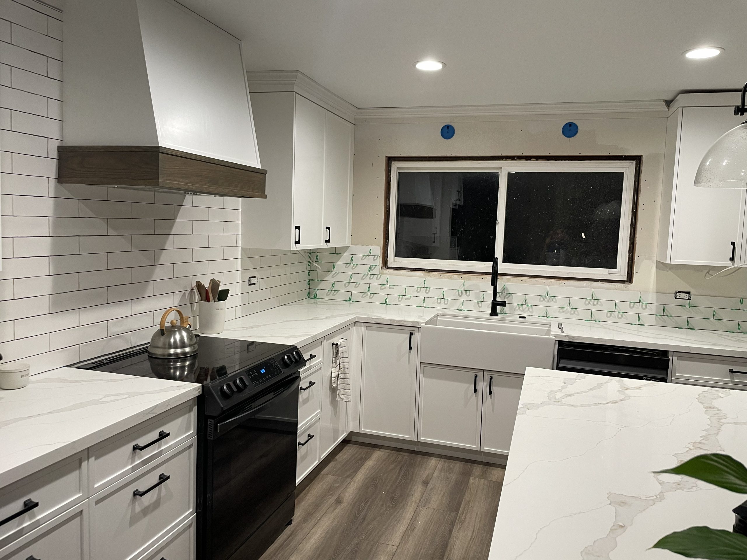 Shower and tub with tile work nearing completion
