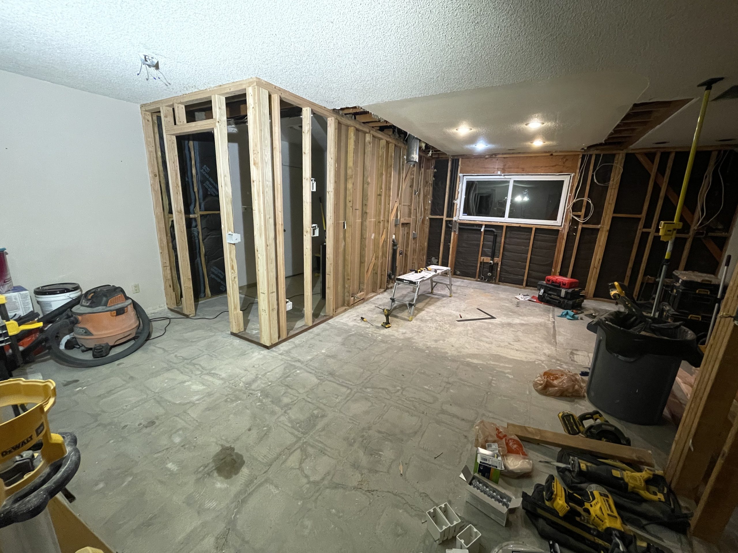 Interior framing with open studs and natural light