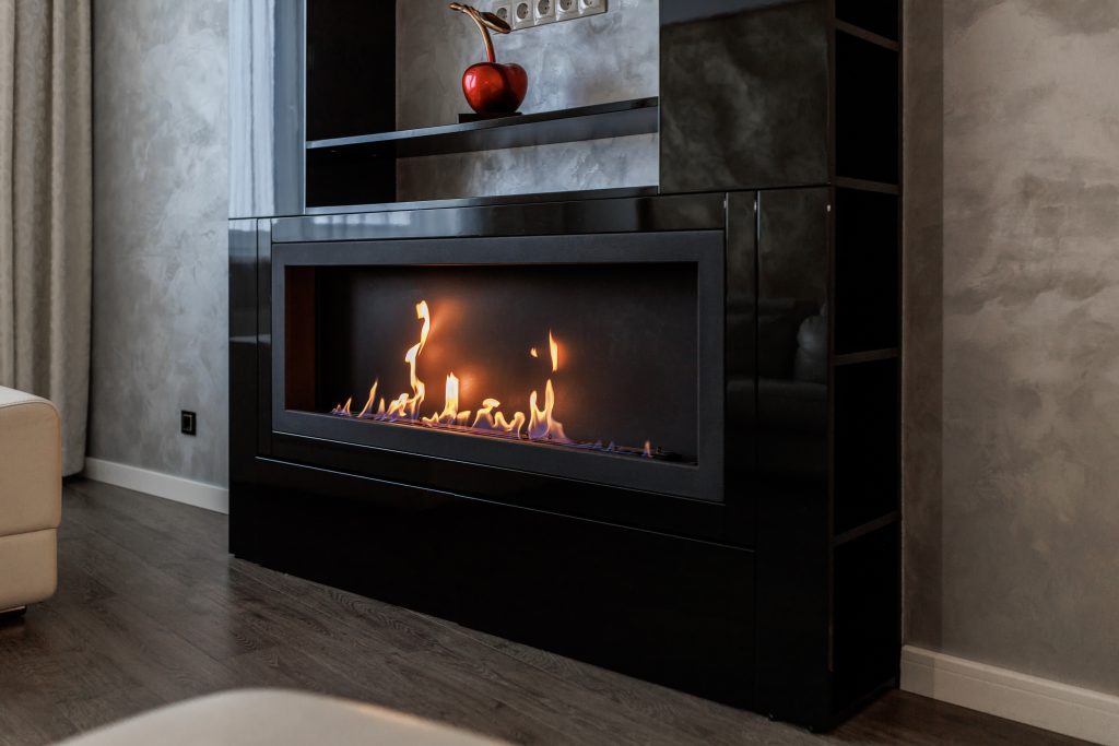 Sleek ethanol fireplace with clean-burning ventless flame in contemporary living space