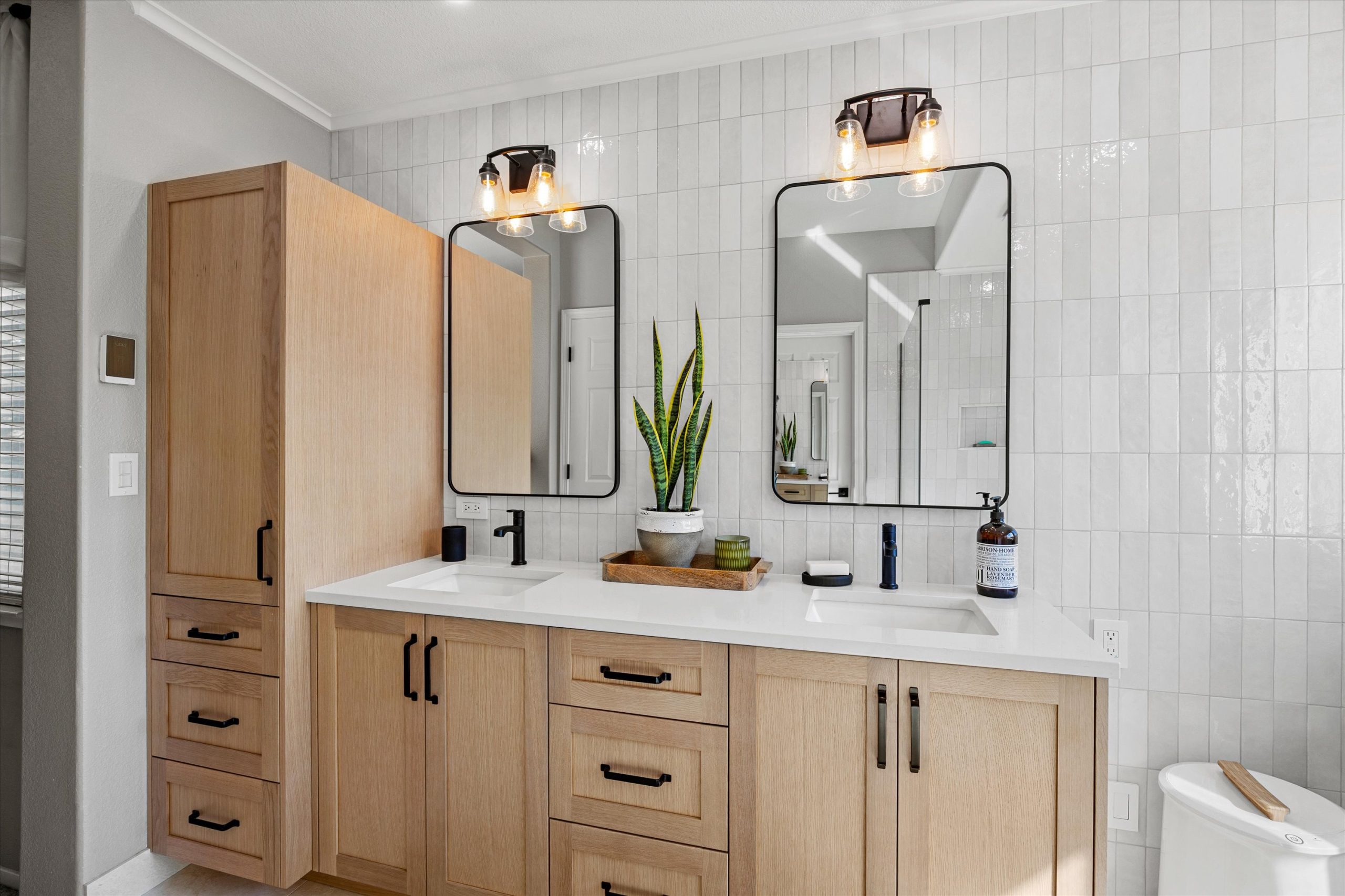 After: Full bathroom view showing design cohesion